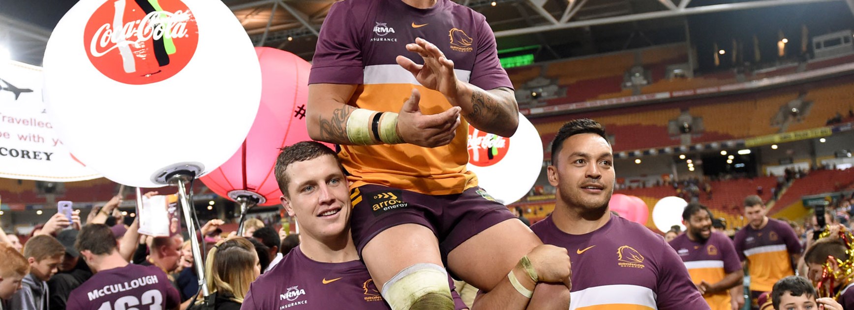 Broncos lock Corey Parker carried off in his farewell game at Suncorp Stadium.