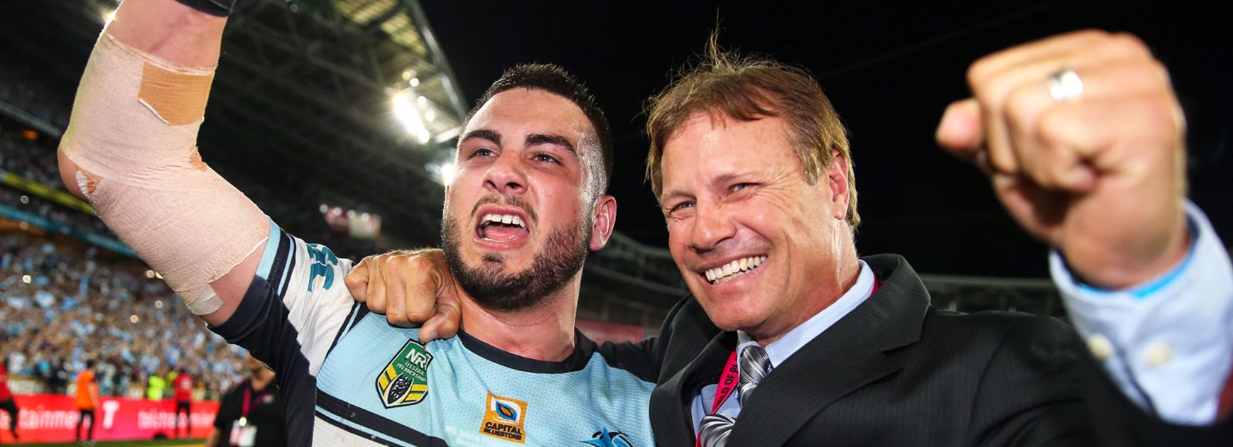 Sharks centre Jack Bird with club legend Andrew Ettingshausen following the grand final.