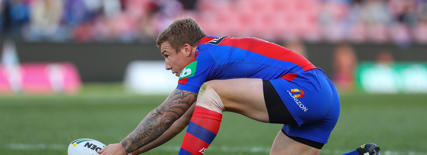 Knights halfback Trent Hodkinson lines up a shot at goal.