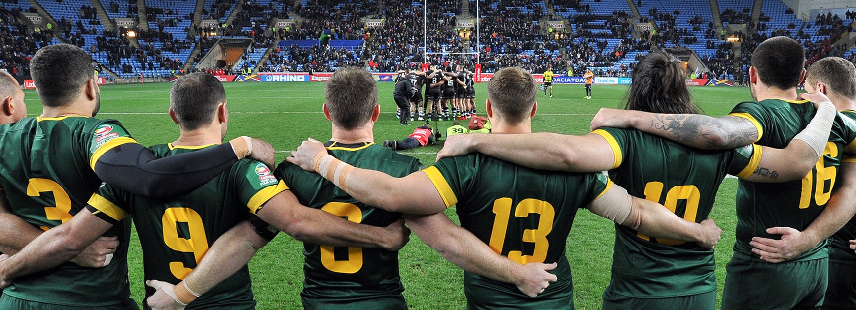 The Kangaroos eye off the Kiwi haka before their Four Nations clash in Coventry.