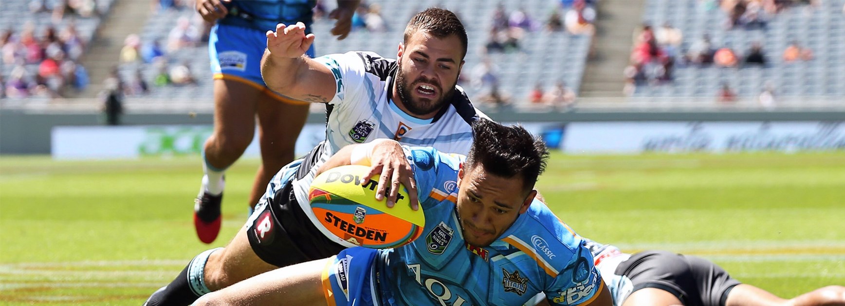 Nathaniel Peteru scores for the Titans against the Sharks at the Auckland Nines.