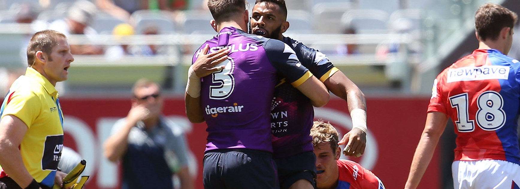Storm players celebrate during their win over the Knights on day two of the Auckland Nines.