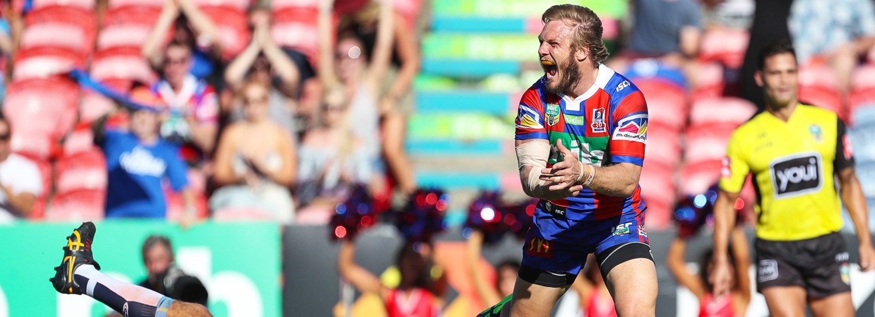 Nathan Ross celebrates a try in the Knights' Round 2 win over the Titans.