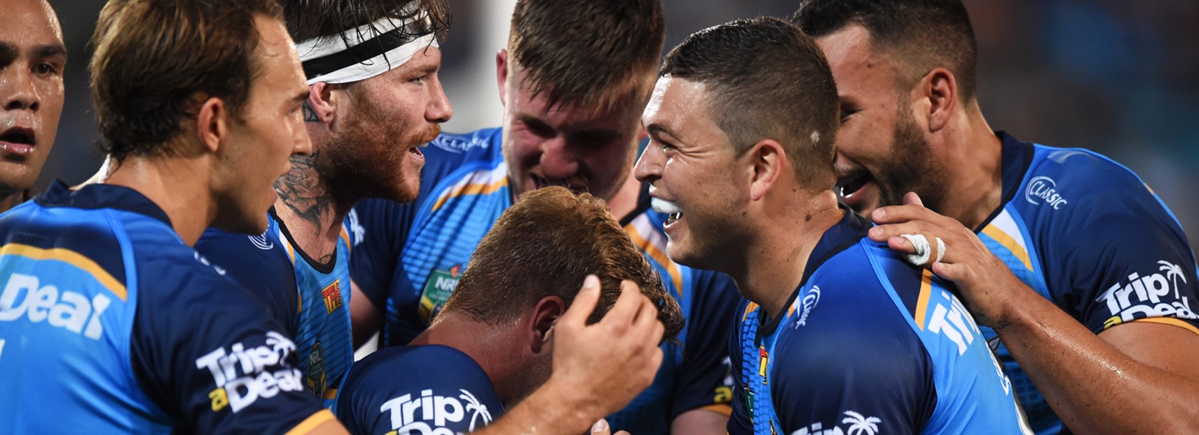 The Titans celebrate Kane Elgey's Round 3 try against the Eels.