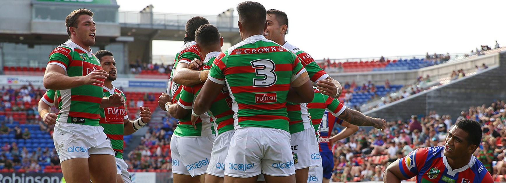 The Rabbitohs celebrate a try against Newcastle on Saturday.