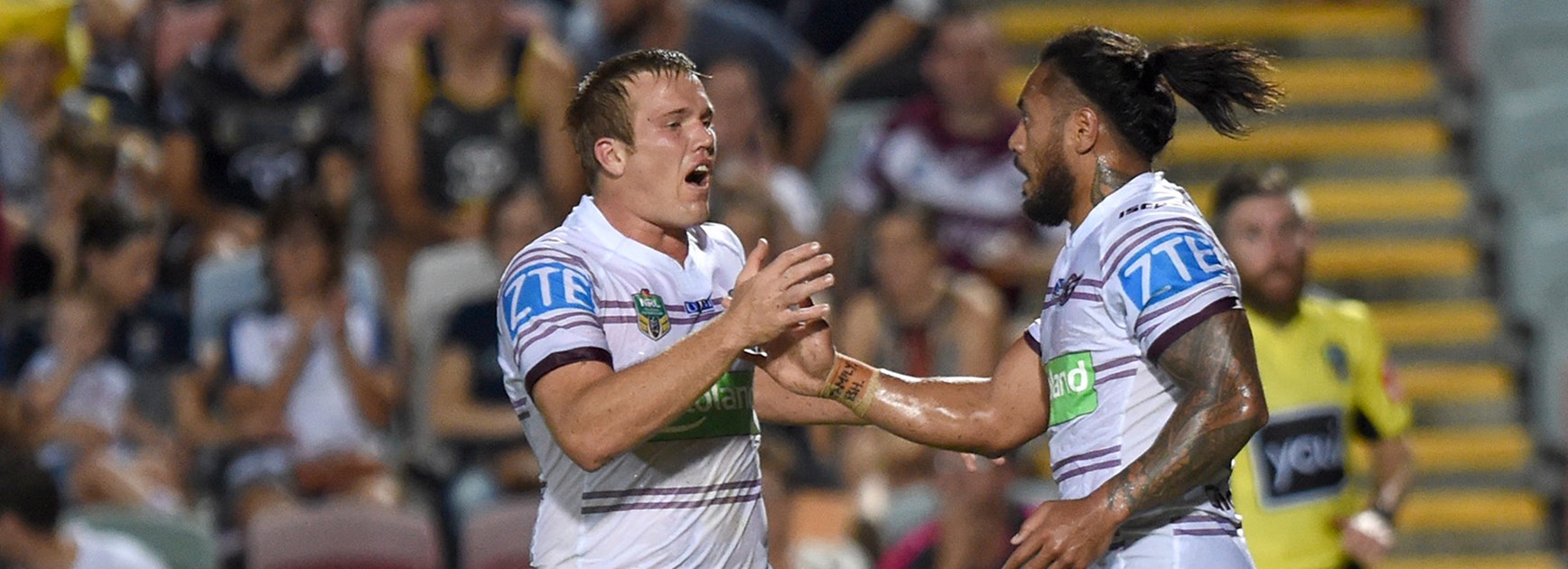 Manly celebrate a try against the Cowboys in Round 3.