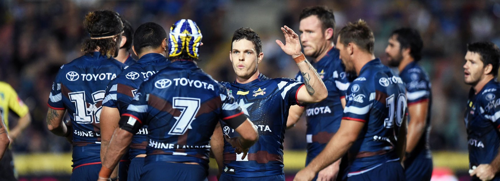 Cowboys players celebrate during their win over the Rabbitohs.