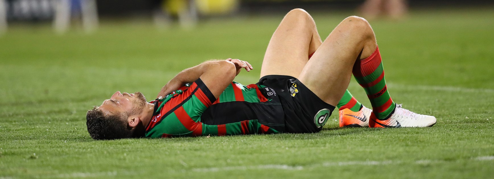 Sam Burgess down injured during the preliminary final.