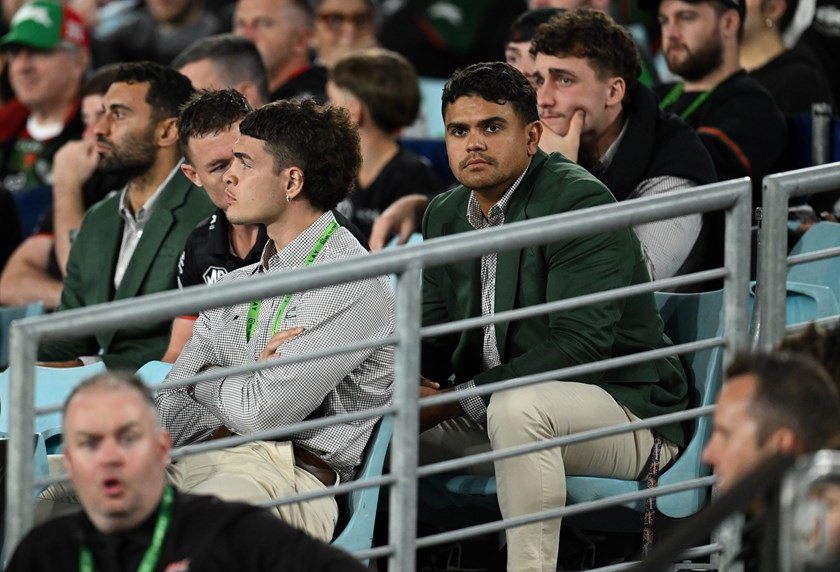Latrell Mitchell (suspended) looks on with Damien Cook and Alex Johnston as a brave Souths crashed 34-22 to Cronulla. 