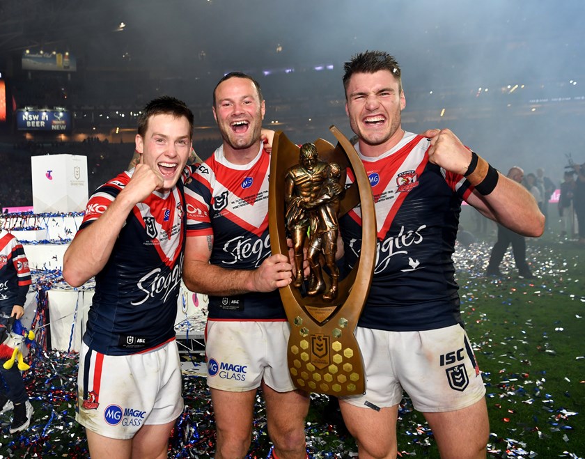 Boyd Cordner (centre) with Angus Crichton (r) and Luke Keary (l) after the 2019 grand final.
