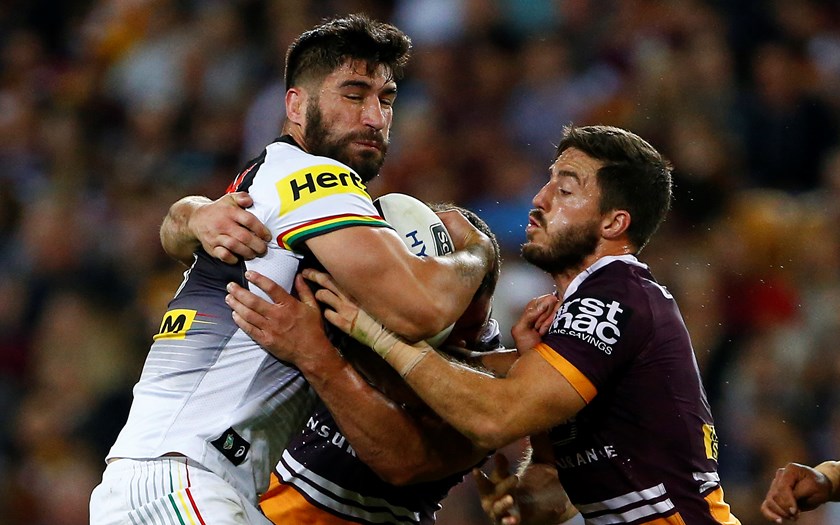 Penrith Panthers prop James Tamou takes on the Broncos defence.