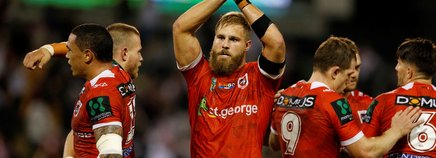 Dragons lock Jack de Belin.