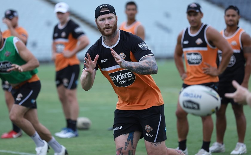 Wests Tigers forward Chris McQueen goes through his paces at training.