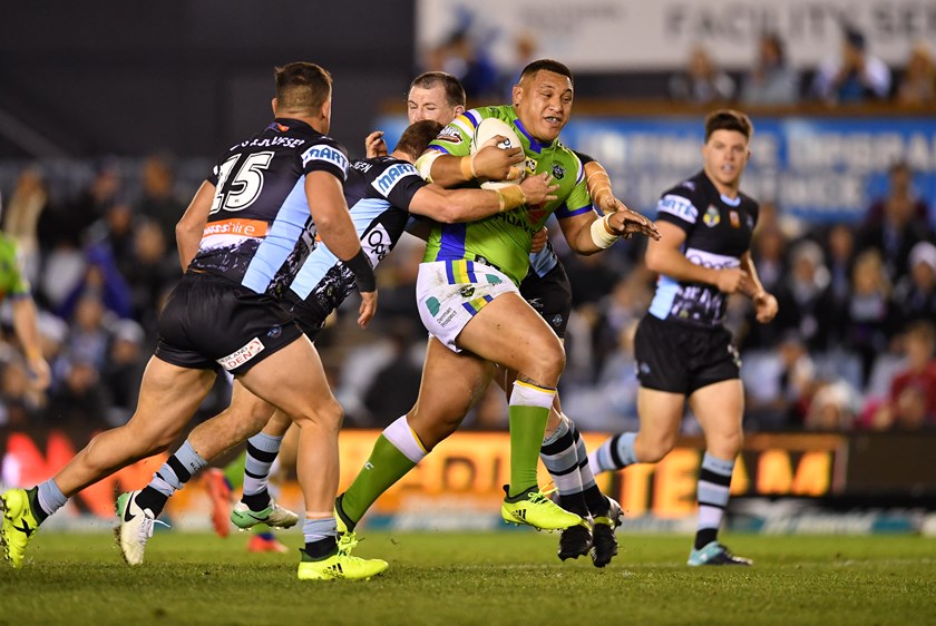 Raiders forward Josh Papalii takes on the Sharks defence.