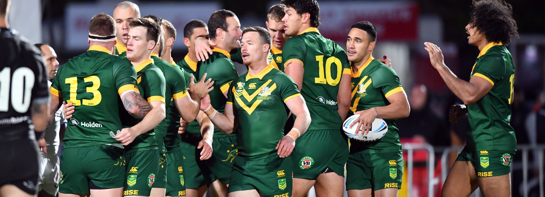 The Kangaroos celebrate a try.