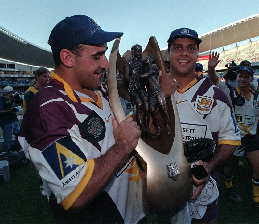 Tonie Carroll and Steve Renouf after Brisbane won the 1998 grand final.
