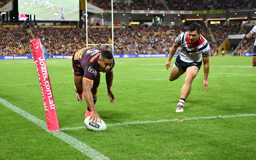 Jamayne Isaako scores a try for the Broncos.