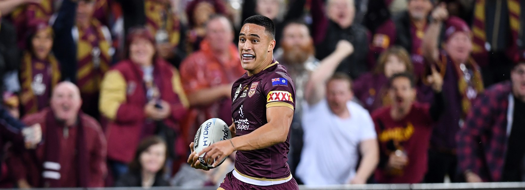 Valentine Holmes runs clear for an intercept try.