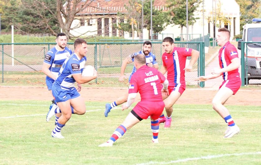 Cronulla's Billy Magoulias charges for Greece at Serbia.