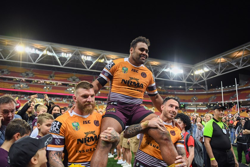 Broncos forward Sam Thaiday is chaired off Suncorp Stadium after the win over Manly.