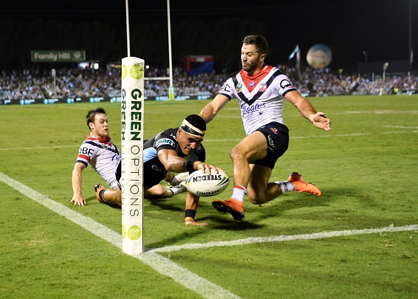 Valentine Holmes scores against the Roosters.