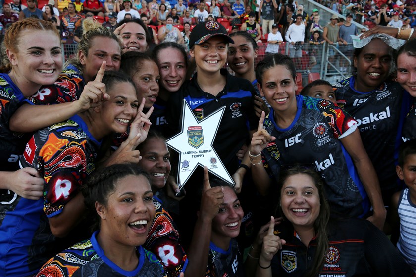 The Indigenous women's team celebrate their 2017 win.