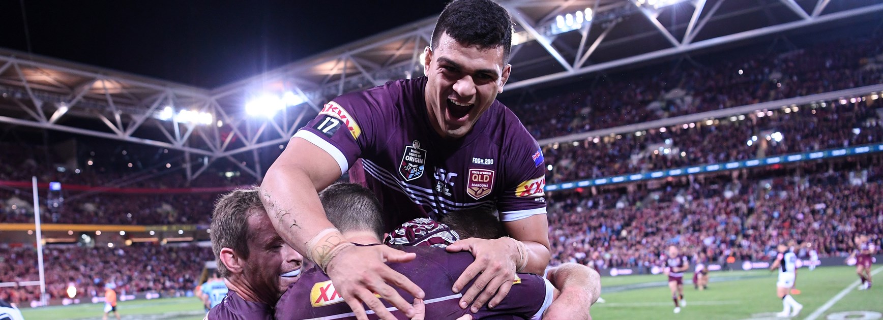 The Maroons celebrate their Origin I win.