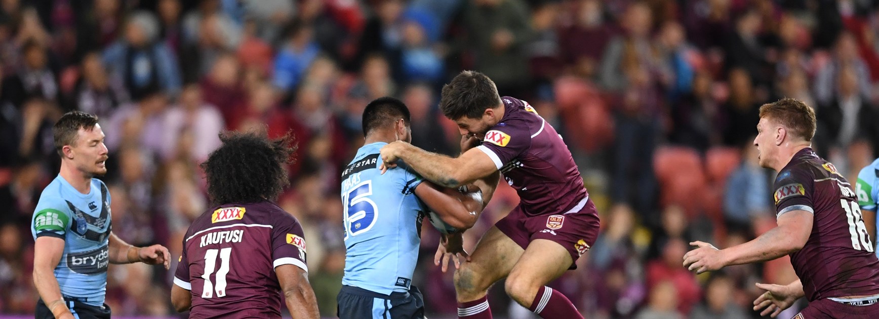 Ben Hunt tries to put the brakes on Payne Haas in Origin I