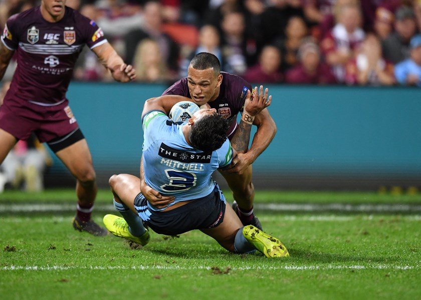Will Chambers tackles Latrell Mitchell.