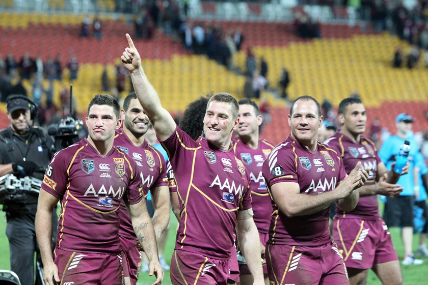 Brent Tate and the Maroons celebrate an Origin win.