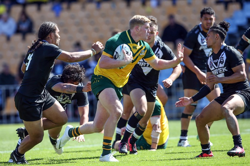 Thomas Flegler scores a try for the Junior Kangaroos in 2018.