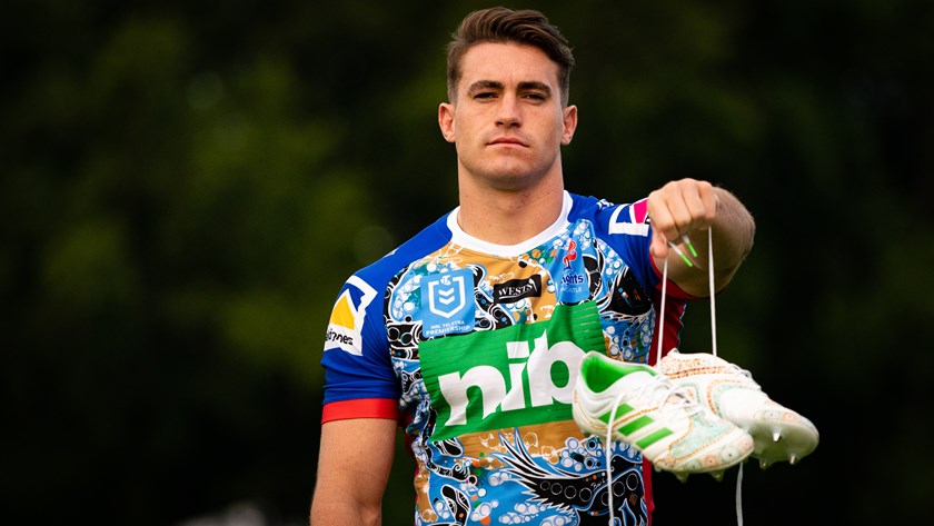 Connor Watson shows off his 2019 Indigenous Round boots.