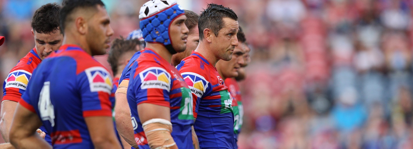 Newcastle Knights players after conceding a try.