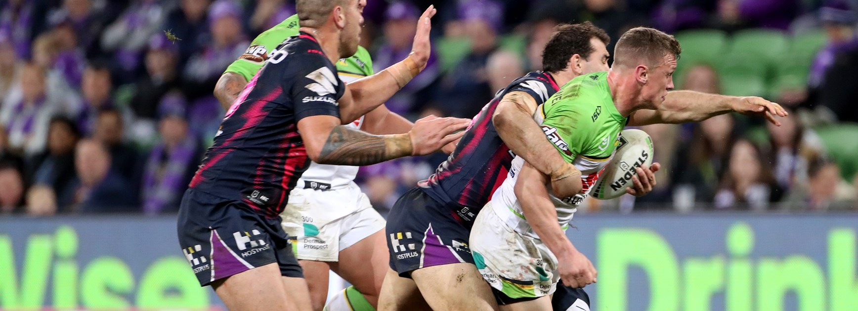 Raiders Jack Wighton crashed into Storm defence