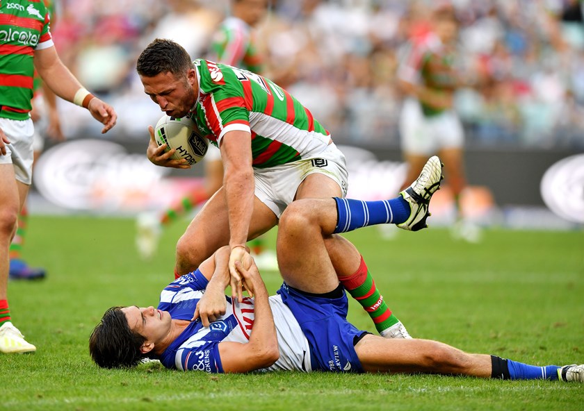 Lachlan Lewis and Sam Burgess had a running battle on Good Friday.