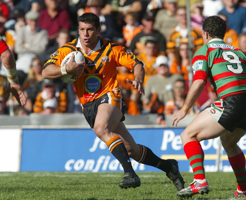 Scott Sattler on the move for Wests Tigers in 2004.