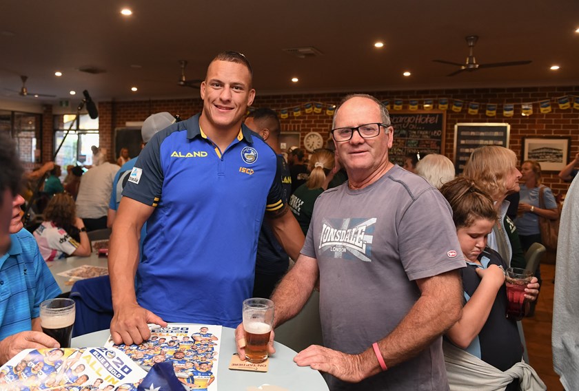 Eels prop Kane Evans with a patron at the Cobargo Hotel.