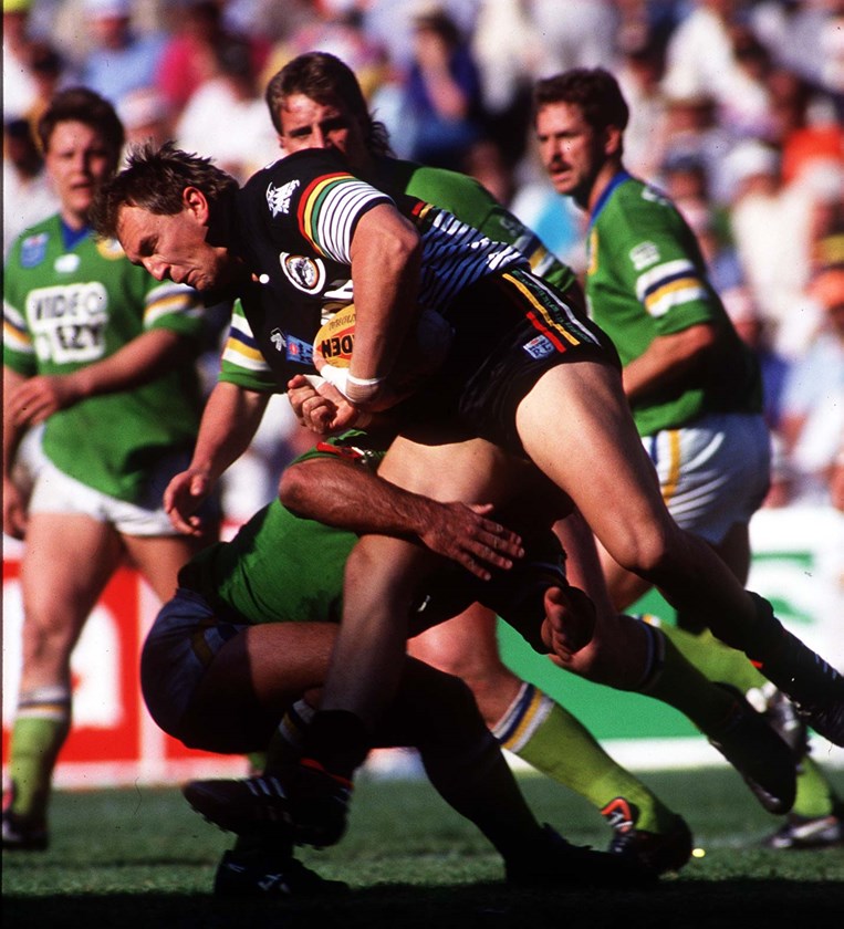 Panthers forward John Cartwright hits it up against the Raiders in 1991.