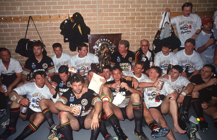 The Penrith players soak up the win in the SFS sheds.