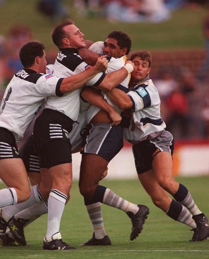 Cowboys forward Ian Russell takes on Wests in 1995.