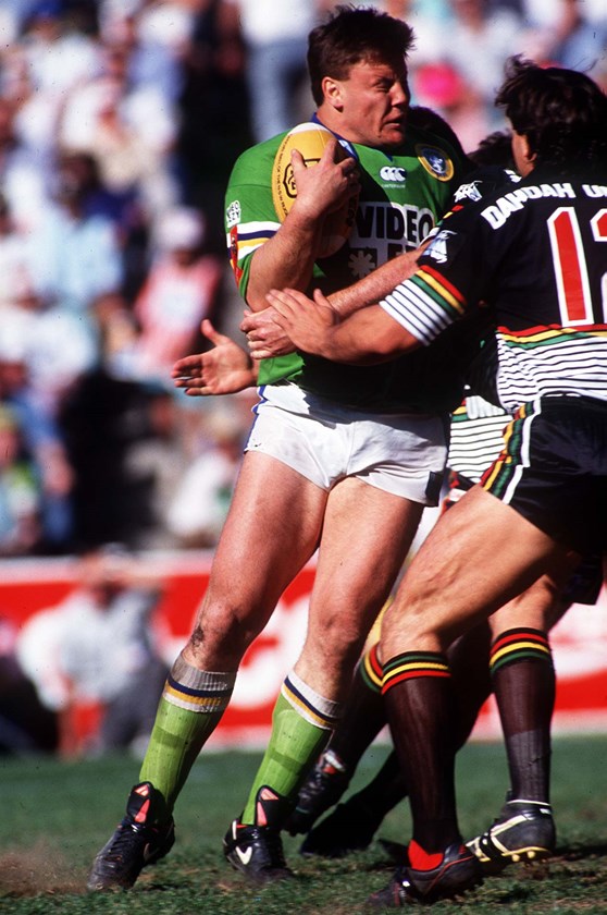 Glenn Lazarus is crunched by the Panthers in the 1991 grand final.