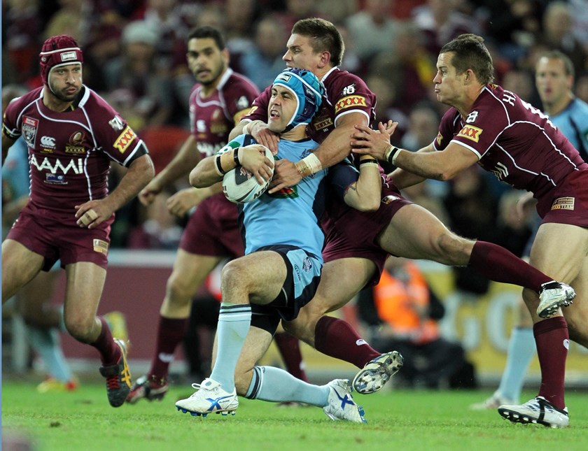 Soward is wrapped up by the Queensland defence in Origin in 2011.