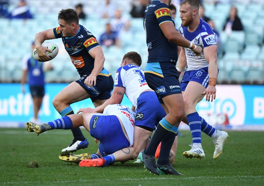 Bulldogs prop Dylan Napa injures his knee against the Titans.
