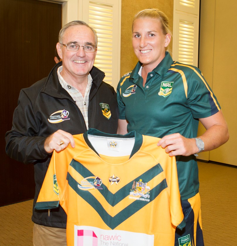 Graham Murray presents Ali Brigginshaw with her 2013 World Cup jersey.