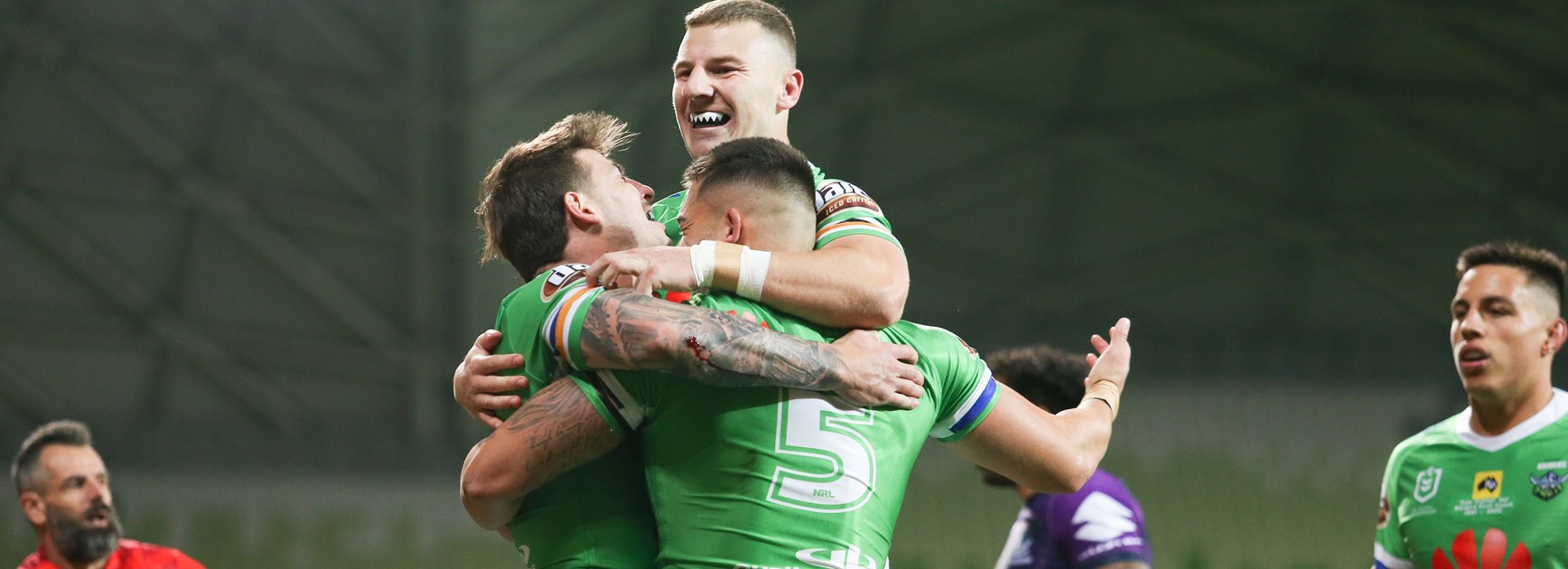 The Raiders celebrate a try in Melbourne.