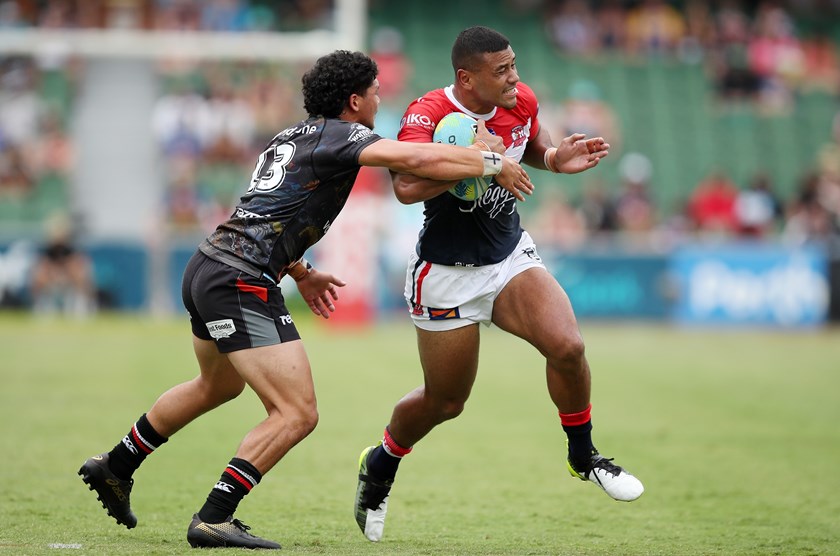 Poasa Faamausili on the charge for the Roosters against the Warriors at the NRL Nines in Perth.