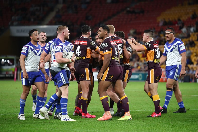 Luke Thompson and Tevita Pangai jnr lock horns.