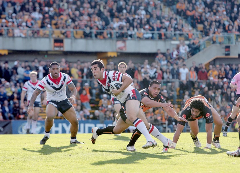 Braith Anasta makes a break for the Roosters.