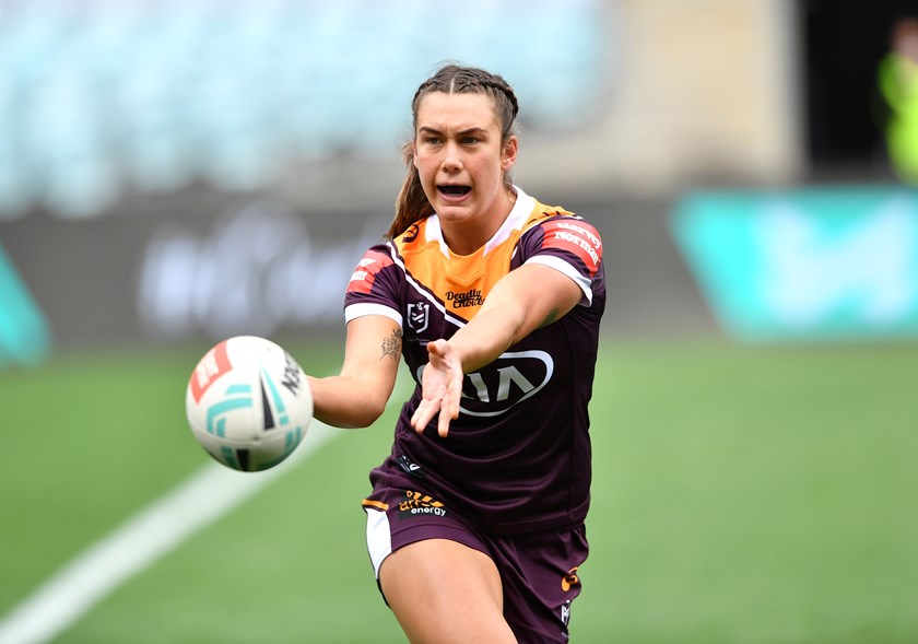 Jess Elliston sends a pass wide for Brisbane.