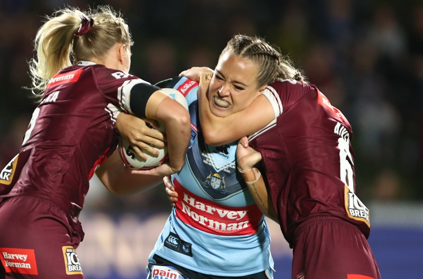 NSW centre Isabelle Kelly tries to bust the Maroons defence in 2020.
